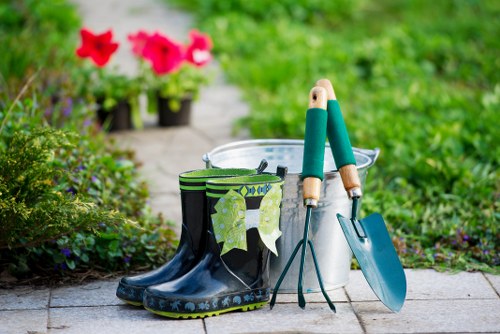 Outdoor garden design in Ardleigh Green with seating and decorative planting